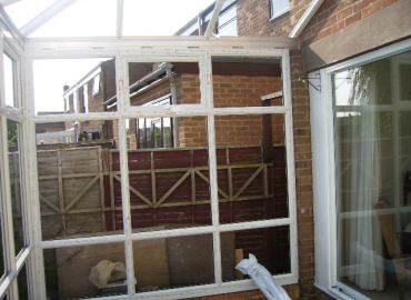 The conservatory frames go up