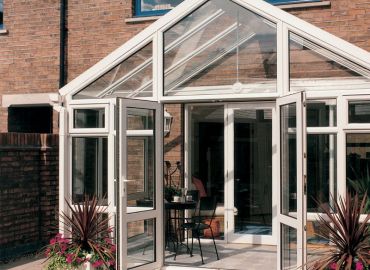 Full-height glass frames & roof allow maxim